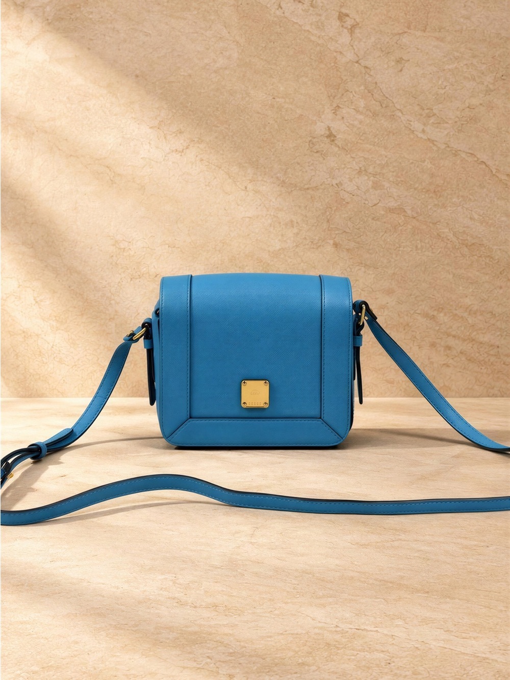 MCM Blue Leather Crossbody with Gold-Tone Plaque